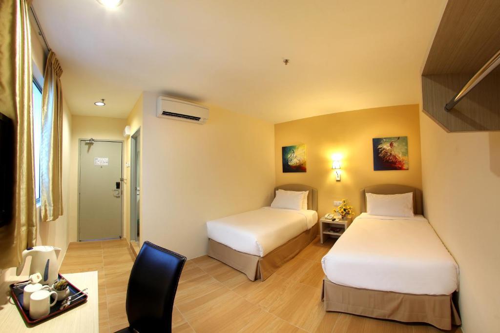 Hotel Min Cott Куала-Лумпур Номер фото